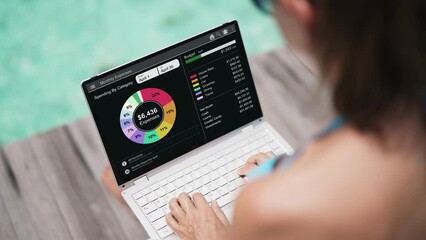 Woman Tracking Budget Using Fintech App