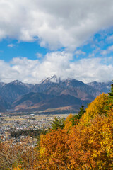 Landscape mountain with clouds and snow in autumn 