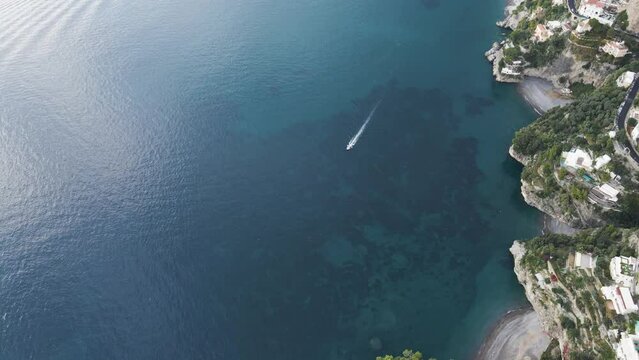 Aerial view of sailing boats along the coast in Positano on the Amalfi Coast drive, Salerno, Campania, Italy.