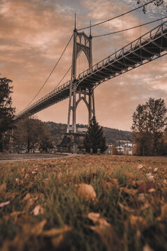 Moody dramatic autumn views of the gothic St Johns Bridge in Portland Oregon
