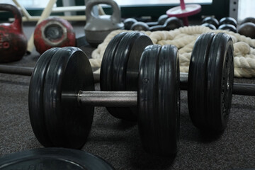 Obraz na płótnie Canvas Kettlebell and dumbbell weight training gym