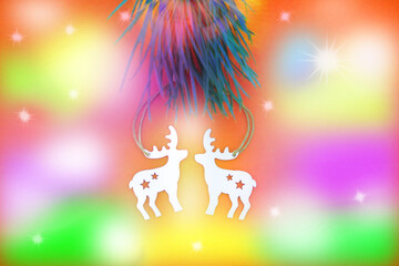Christmas tree, decorations toys, colorful lights. Christmas still life with reindeers. Fairy festive atmosphere. Happy New Year. Multicolored toned