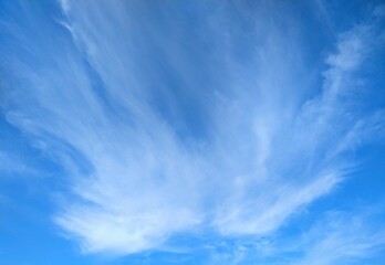 Fluffy, Streaking Clouds in Blue November Sky