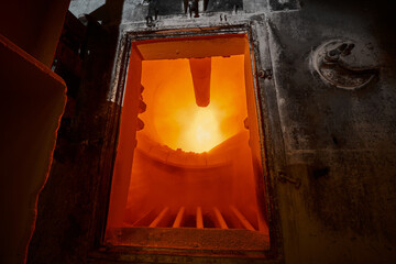 Work area of rotating lime burning kiln with burning flame