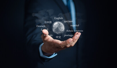 Businessman holding virtual translation or translate on the mobile app worldwide language...
