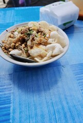 Indonesian street food that is much sought after in the morning called chicken porridge