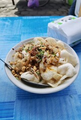 Indonesian street food that is much sought after in the morning called chicken porridge