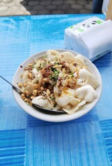 Indonesian street food that is much sought after in the morning called chicken porridge