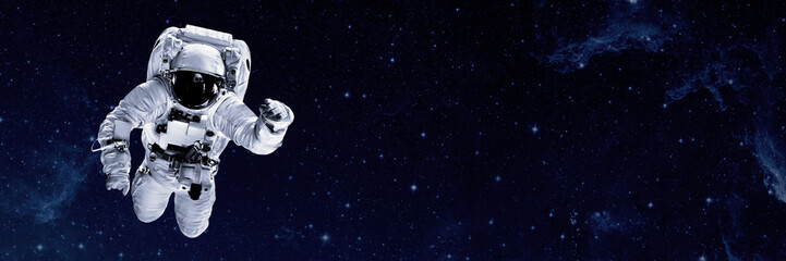 Small child wants to fly into space wearing an astronaut's helmet
