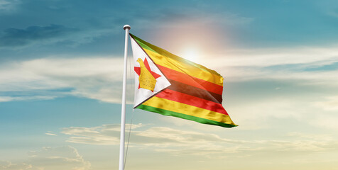 Zimbabwe national flag cloth fabric waving on the sky - Image