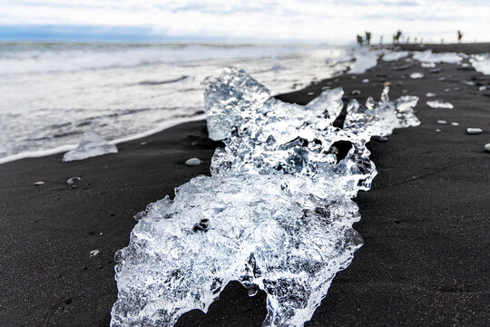 Diamond beach Iceland is known for iceberg washed onshore scattered on its black sand