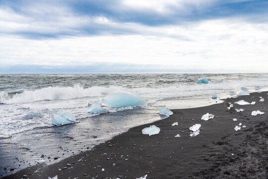 Diamond beach Iceland is known for pieces of iceberg washed onshore scattered on its black sand