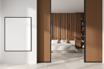 Front view on bright bedroom interior with empty white poster