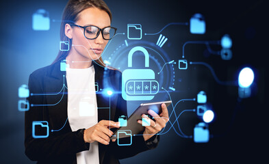 Businesswoman in formal wear holding tablet device with digital