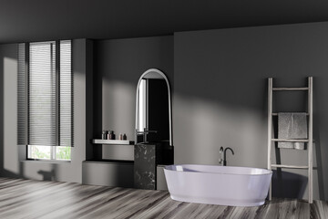 Grey bathroom interior with bathtub and sink with panoramic window. Copy space