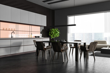 Corner view on dark kitchen room interior with panoramic window