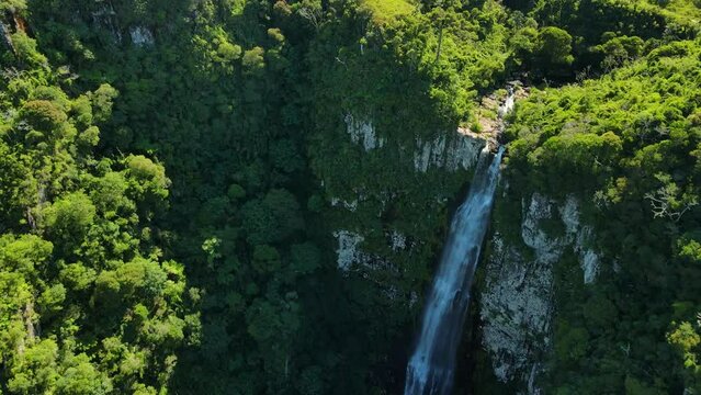 Aerial view of Espraiado Canyon with scenic waterfall in Santa Catarina, Brazil.