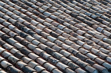 Rows of curved, ceramic roof tiles make an attractive pattern on building in southern Spain.