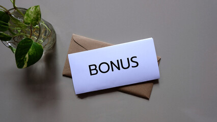 concept of bonus, communication by pulling paper of bonus from the envelope.