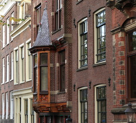 Fototapeta premium Amsterdam Reguliersgracht Canal House Facades Close Up with Bay Window and Carved Wooden Details, Netherlands