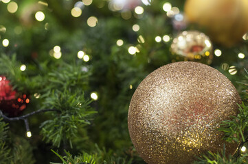 Glitter Christmas ball. Xmas ball on the tree.