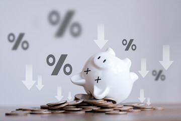 The financial crisis, end of savings, bankruptcy. Devaluation, inflation. Impoverishment. world economics, and inflation control. The dead piggy bank lies upside down on coins. Economic depression.