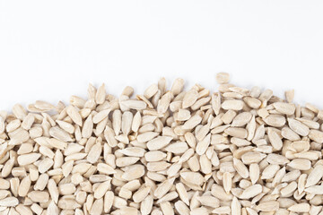 Sunflower seeds texture as background. Top view. Space for text.