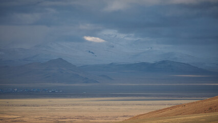 clouds over the mountains. Altai region.