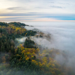 Panoramic view on the Odenwald near Lampenhain and Fog over the Rhine Valley in Germany.