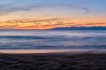 Sunset on Lake Baikal in the Barguzin Bay. Republic of Buryatia, Maksimikha settlement.