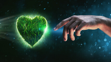 Naklejka na ściany i meble ESG Concept. Green Leaf as Heart Shape and a human hand reaches out to touch.