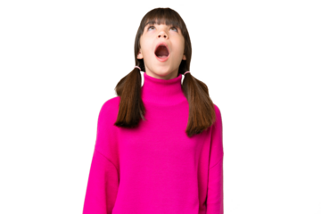 Little caucasian girl over isolated background looking up and with surprised expression
