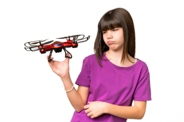Little caucasian girl holding a drone over isolated background with sad expression