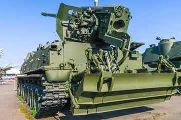 Fototapeta na wymiar Soviet and Russian self-propelled artillery installations. Self-propelled howitzer. Tracked combat vehicle. Large-caliber self-propelled gun. Armament of the army.