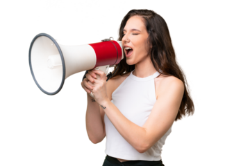 Young caucasian woman isolated over isolated background shouting through a megaphone