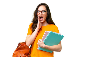 Young student caucasian woman over isolated background with surprise and shocked facial expression
