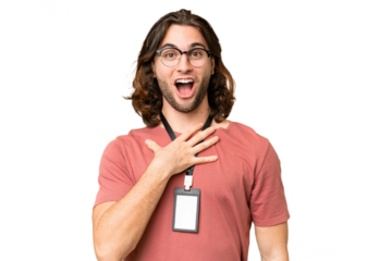 Young handsome man with ID card over isolated background surprised and shocked while looking right