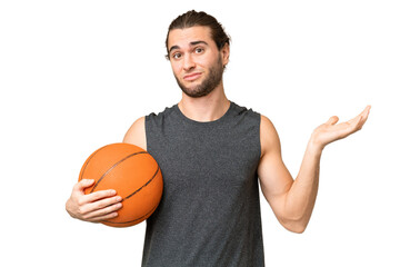 Obraz premium Young basketball player man over isolated background having doubts while raising hands