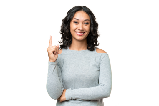 Young Argentinian woman over isolated background pointing up a great idea