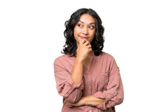 Young Argentinian woman over isolated background and looking up