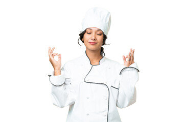 Young chef Argentinian woman over isolated background in zen pose