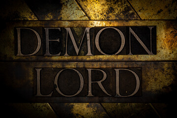 Demon Lord text with on grunge textured copper and gold background 