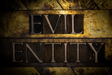 Evil Entity text with on grunge textured copper and gold background