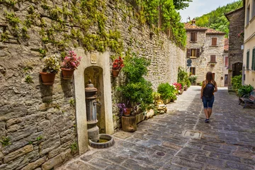 Fotobehang  Italian street in a small provincial town of Tuscan © Oleg Zhukov