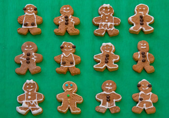Gingerbread cookies on the green background