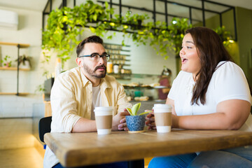 Angry caucasian man annoyed with his girlfriend