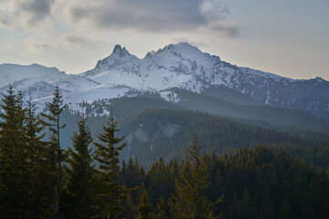 Obraz premium Aerial view over the mountains top. Winter landscape