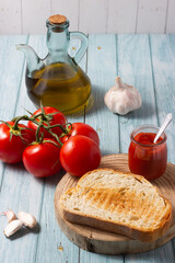 Slice of homemade bread with oil, tomato and garlic. Typical breakfast from Catalonia, Spain.