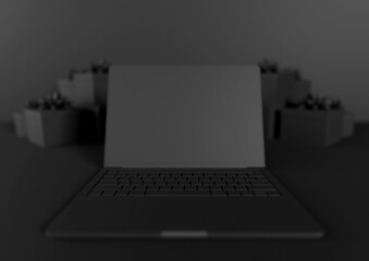 Black Friday / Cyber Monday. Laptop computer and presents with ribbons. Black background. Copy space. Online shopping.	