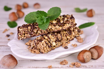 Cereal bars with nuts, raisins, oatmeal and honey. healthy protein snack.